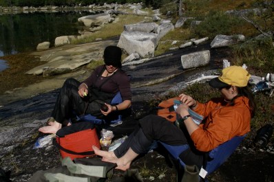 Joolee and Tina enjoy lunch on a rare dry day in Prince William Sound